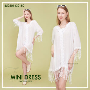 Romantic white dress with floral lace details and fringe hem