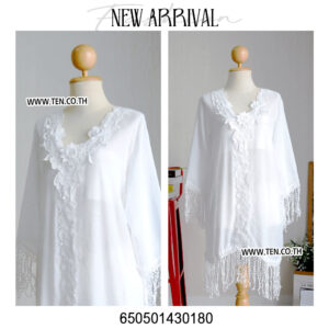 Romantic white dress with floral lace details and fringe hem