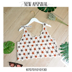 Crochet floral blouse with handmade design, perfect for summer fashion