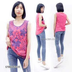 Floral embroidered lace top on a model, featuring intricate designs for a chic look