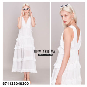 Ruffled maxi dress in white and cream tones on mannequin and hanger.