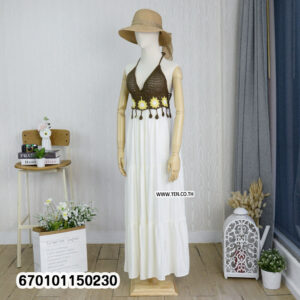 Elegant floral crochet maxi dresses in green and brown on display in a minimalist interior.