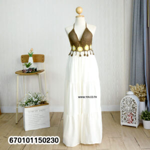 Elegant floral crochet maxi dresses in green and brown on display in a minimalist interior.