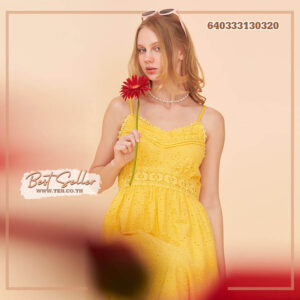 Delicate lace pastel maxi dresses in multiple shades on display.