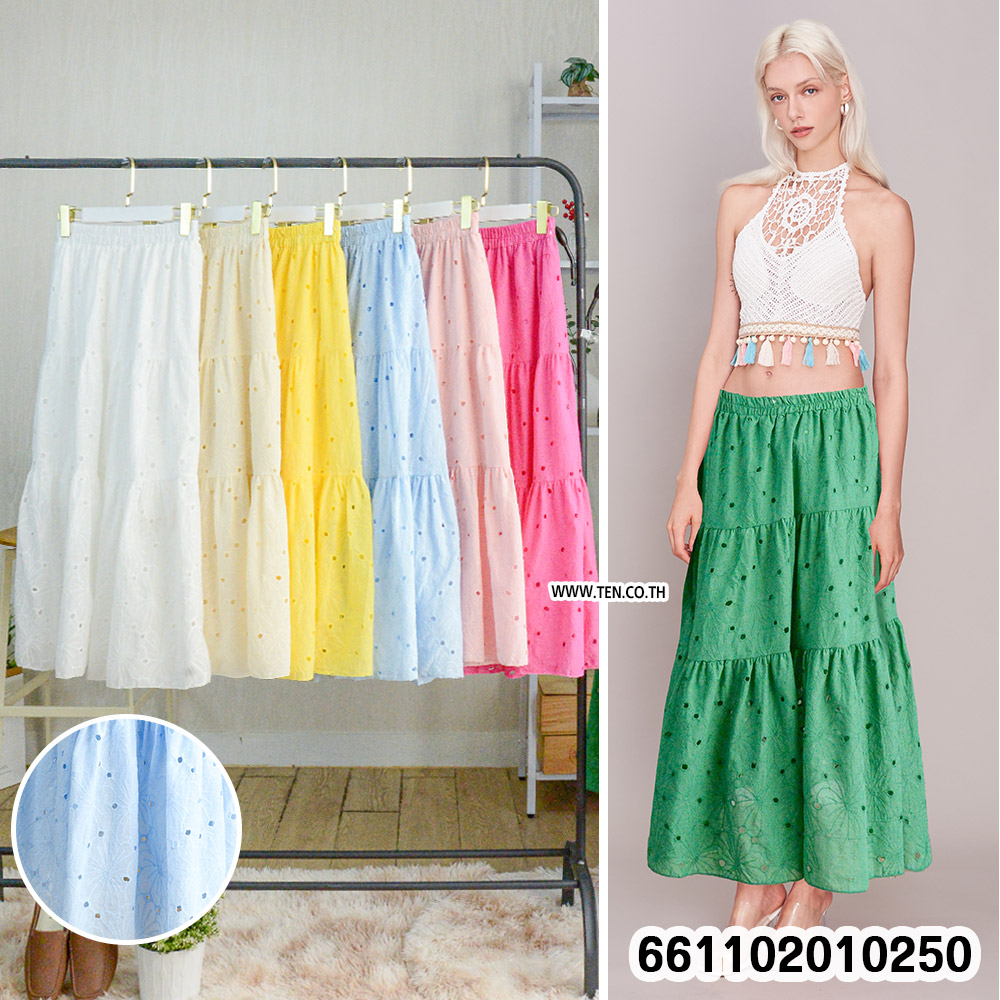 Romantic pastel lace skirts hanging on rack with boho details