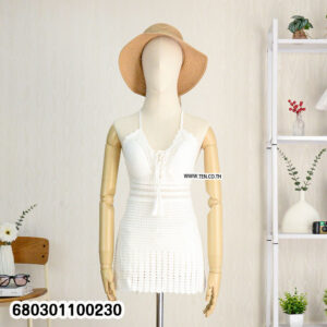 Boho crochet summer dress in multiple colors on mannequin and hangers