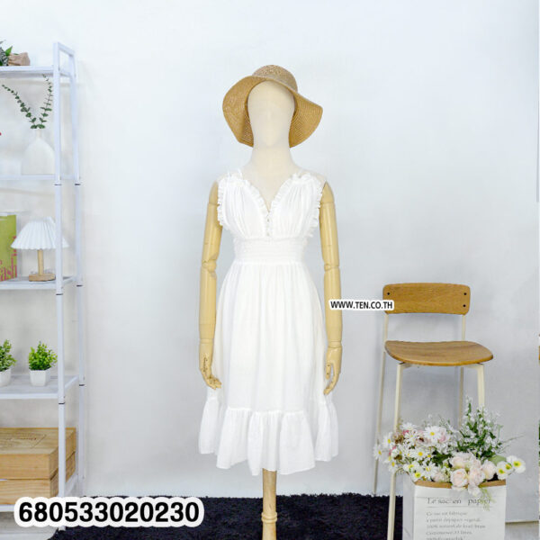 white ruffle midi dress ideal for travel and beach vacation style