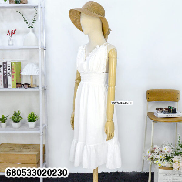 white ruffle midi dress ideal for travel and beach vacation style