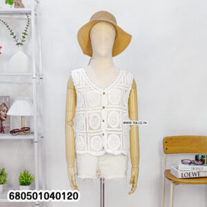 Handmade crochet vest top in off-white displayed on a mannequin with shorts and hat