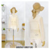 Delicate crochet top with see-through long sleeves styled with white shorts and floppy hat