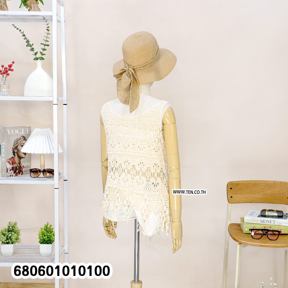 Textured crochet tank top with floral lace and fringe hemline for summer