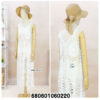 Front and back views of a white crochet maxi dress on a mannequin, highlighting its intricate, sheer design.