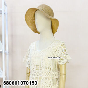 Front and back views of a handmade crochet summer blouse styled with straw hat and white shorts