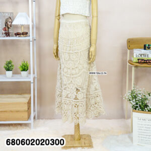 Boho crochet midi skirt in white and beige displayed on mannequin and hanger