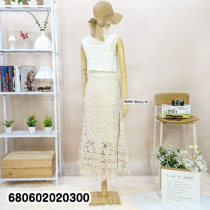 Boho crochet midi skirt in white and beige displayed on mannequin and hanger
