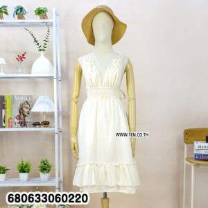 Mannequin wearing a white ruffle summer dress with deep V-neck and elastic waist, styled for casual summer fashion.