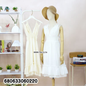 Mannequin wearing a white ruffle summer dress with deep V-neck and elastic waist, styled for casual summer fashion.