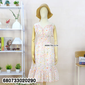Group of pastel floral summer dresses on hanger beside mannequin styled with hat