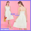 Breezy white cotton midi dress styled with a beach hat, shown from front and ba