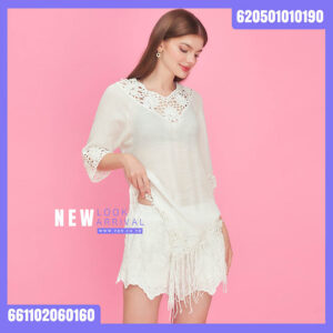 Crochet fringe blouse worn as a summer beach cover-up with lightweight boho style.