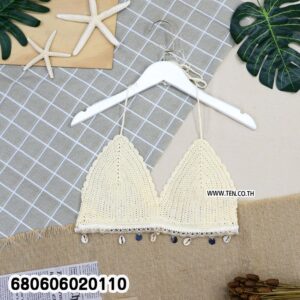 Crochet bikini top with shell edging in beige, black, and white.