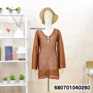 A black long-sleeve beach cover-up on a mannequin, highlighting its coverage and elegant drape.