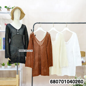A black long-sleeve beach cover-up on a mannequin, highlighting its coverage and elegant drape.