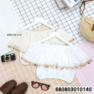 Bohemian summer off shoulder top with lace trim in beige and white, styled flat lay.