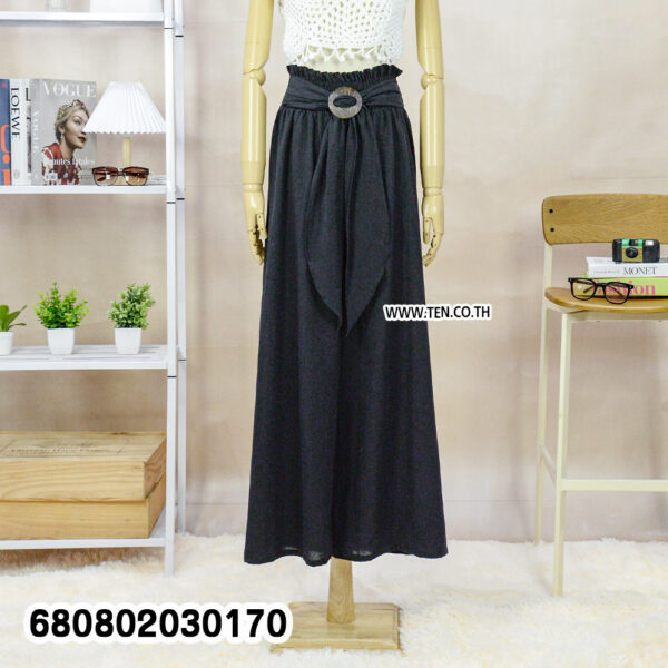 Lightweight palazzo pants styled with a straw hat and white crochet top for summer outfits.