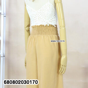 Summer palazzo pants styled with a straw hat and white crochet top on a mannequin