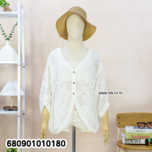 Lightweight lace jacket styled as a summer beach cover-up