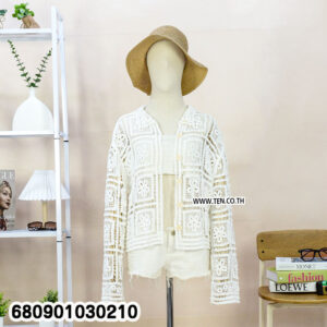 Sleeveless crochet cardigan styled for summer layering, displayed at Ten Design garment shop.
