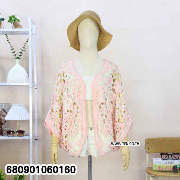 Lightweight summer cardigan folded for retail display