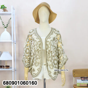 Lightweight summer cardigan folded for retail display