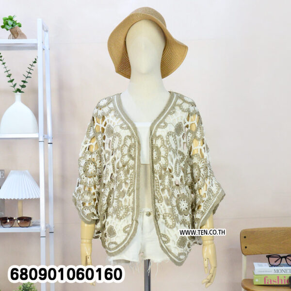 Lightweight summer cardigan folded for retail display