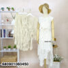 Crochet lace matching set in cream and white, displayed on hanger and mannequin with summer hat