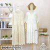 White and beige boho crochet summer dresses on mannequin and hanger