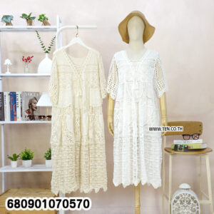 White and beige boho crochet summer dresses on mannequin and hanger