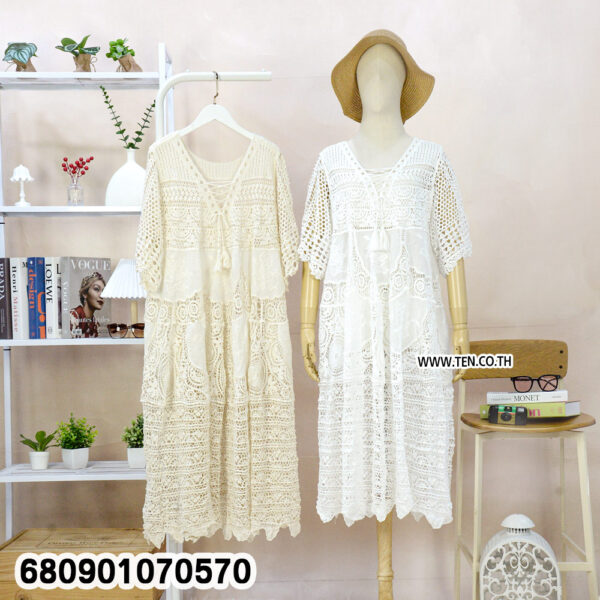 White and beige boho crochet summer dresses on mannequin and hanger