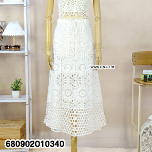 White crochet skirt with matching crop top, styled for summer outfit ideas.