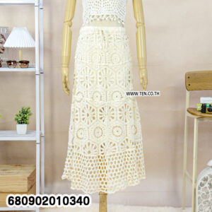White crochet skirt with matching crop top, styled for summer outfit ideas.