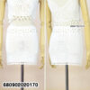 "White handmade crochet mini skirt styled with floral waist detail and boho design"