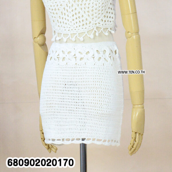 "Handmade boho mini skirt styled with linen blouse and sandals for summer beachwear fashion"