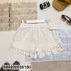 “Crochet lace shorts paired with casual summer essentials”