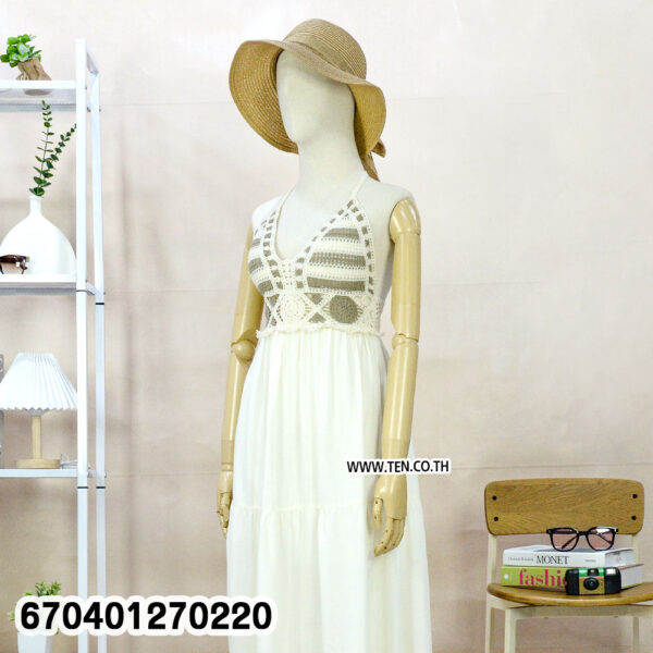 Boho crochet white maxi dress with tie-back and woven top, styled with straw hat.