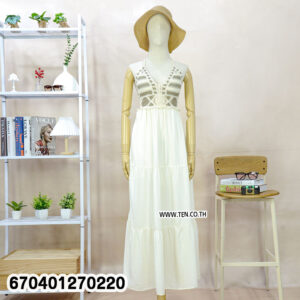 Boho crochet white maxi dress with tie-back and woven top, styled with straw hat.