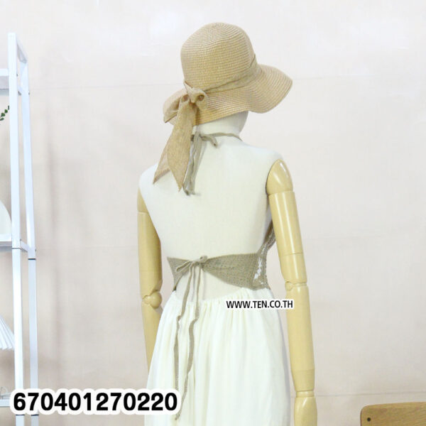 Boho crochet white maxi dress with tie-back and woven top, styled with straw hat.