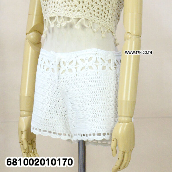 "Crochet beachwear shorts outfit front view – handmade white crochet beachwear shorts with floral waistband, free size and stretchable back for summer fashion."