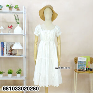 White puff sleeve summer mini dress made from cotton eyelet fabric displayed on mannequin
