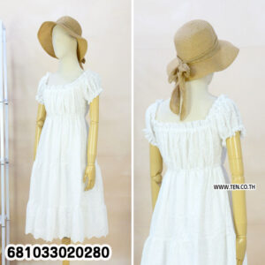White puff sleeve summer mini dress made from cotton eyelet fabric displayed on mannequin